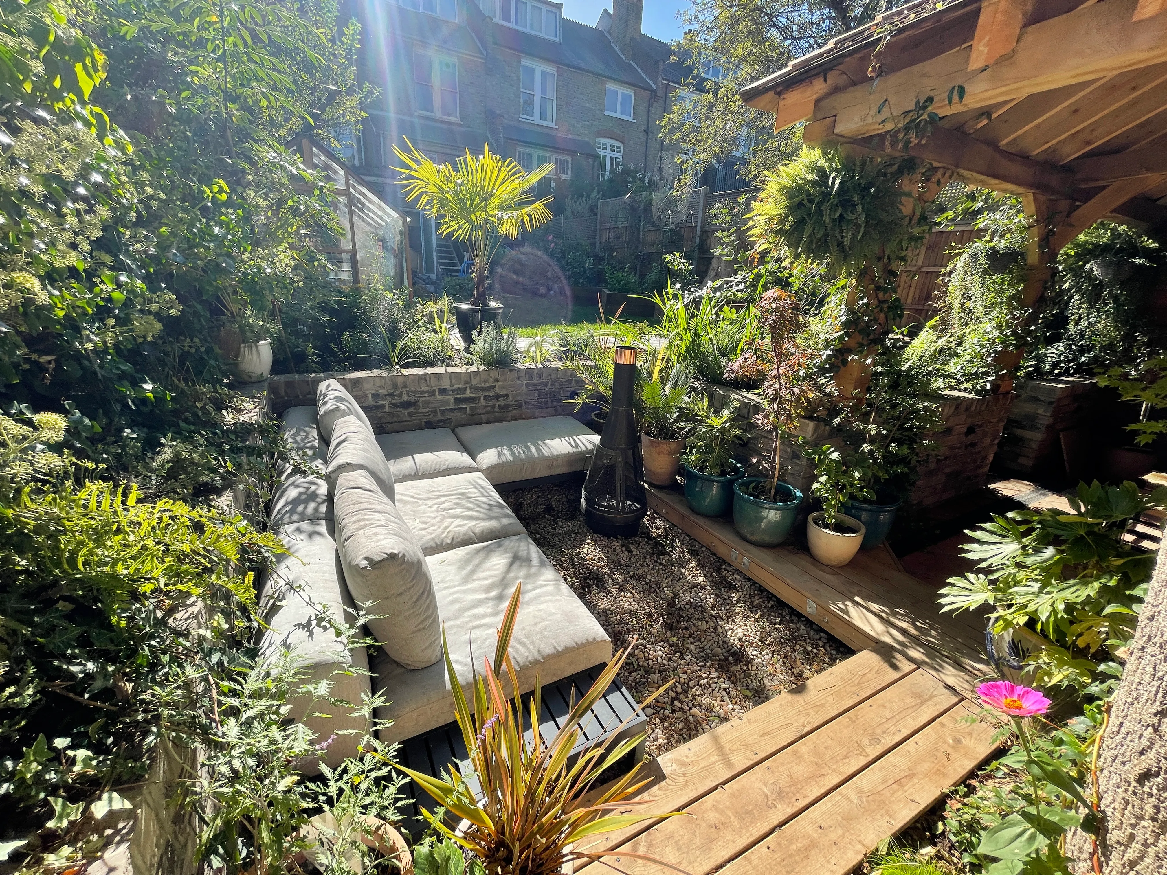 Photo of bathroom with marble walls and gold tap