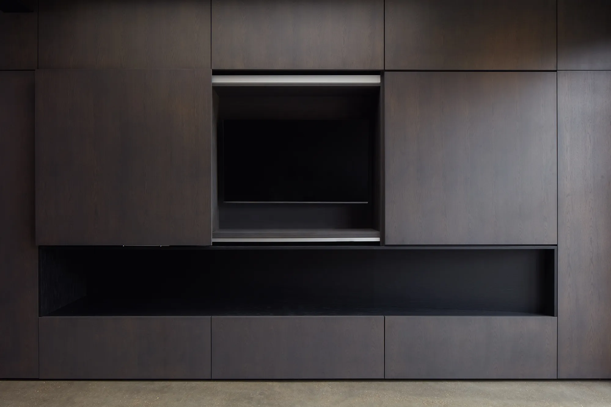 Photo of bathroom with marble walls and gold tap